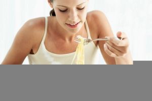 Woman-eating-pasta-1713452 copy
